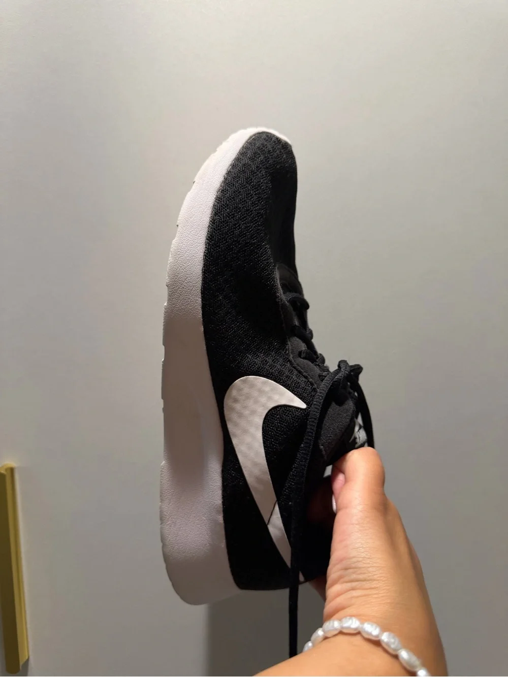 Nike Black Mesh Sneaker with White Swoosh
